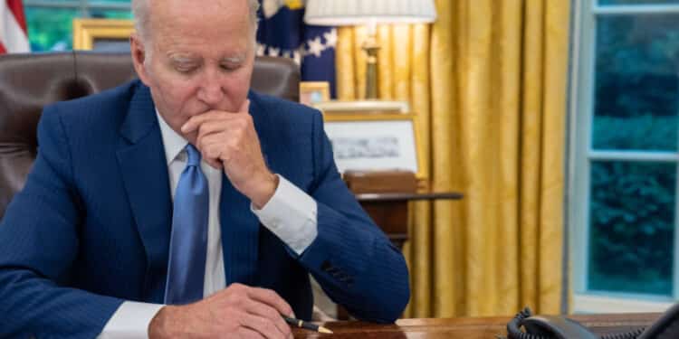 President Joe Biden talks on the phone with Canadian Prime Minister Justin Trudeau in the Oval Office of the White House, Wednesday, June 7, 2023, to talk about the Canadian wild fires and the smoke blanketing parts of the U.S. (Official White House Photo by Adam Schultz)