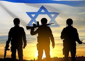 Silhouette of soldier with Israel flag against the sunrise. Concept - armed forces of Israel. EPS10 vector