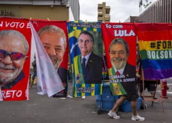 Sao Paulo, Brazil - Jul 17, 2022  - Street vendors sell towels and posters with the image of leftist presidential candidate Luiz Inácio Lula da Silva on Avenida Paulista, Sao Paulo city, Brazil