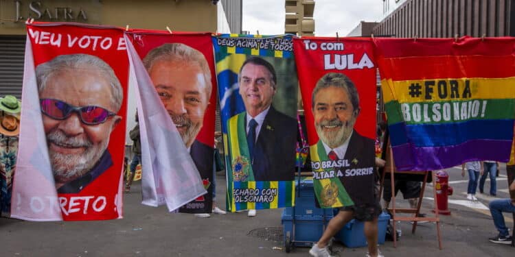 Sao Paulo, Brazil - Jul 17, 2022  - Street vendors sell towels and posters with the image of leftist presidential candidate Luiz Inácio Lula da Silva on Avenida Paulista, Sao Paulo city, Brazil