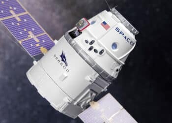 Moletai/Lithuania October 12, 2020 SpaceX Crew Dragon spacecraft docking to the International Space Station. Dragon is capable of carrying up to 7 passengers to and from Earth orbit, and beyond.