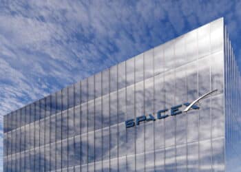 June 15, 2020, Editorial Use Only, 3D CGI. SpaceX Glowing Signage Logo on Top of Glass Building. Workplace in High-rise Office Headquarter at Day Time.