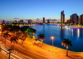 Campina Grande, Paraiba, Brazil on December 12, 2013. Night view of the old weir with buildings in the city center in the background.