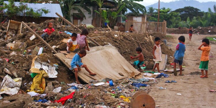 This street children in Asia makes the dumping area as their play ground