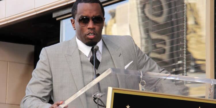 Sean Combs
at the Kenny "Babyface" Edmonds Honored Star on the Hollywood Walk Of Fame, Hollywood, CA 10-10-13