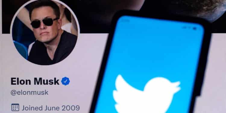 April 11, 2022, Brazil. In this photo illustration the Twitter logo seen displayed on a smartphone with the Elon Musk's official Twitter profile