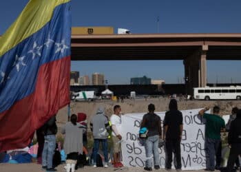 Juarez, Mexico, 10-24-2022: Venezuelan migrants protest at the border to request the termination of title 42, a law that allows migrants to be expelled immediately