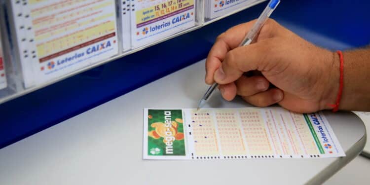 salvador, bahia, brazil - january 25, 2021: person is seen placing the Mega Sena bet in a lottery in the city of Salvador.