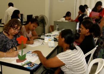 vitoria da conquista, bahia, brazil - october 31, 2011: People are seen while attending the registration service in the Bolsa Familia program in the city of Vitoria da Conquista.