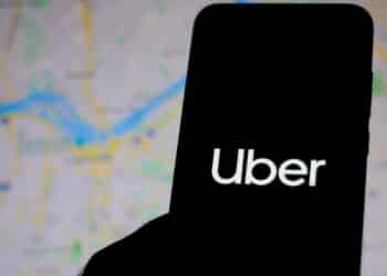 December 11, 2019. In this photo illustration the Uber logo is seen displayed on a smartphone.