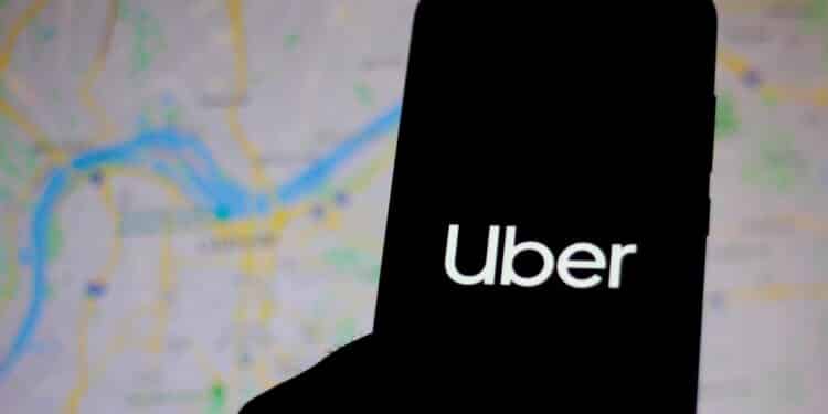 December 11, 2019. In this photo illustration the Uber logo is seen displayed on a smartphone.