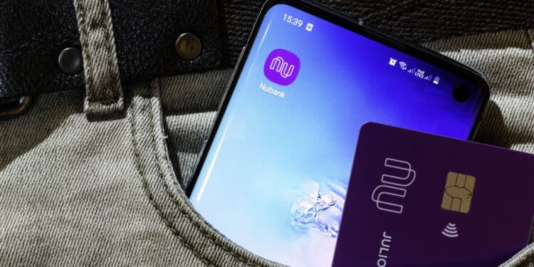 Sao Paulo, Brazil - March 29, 2020: Nubank logo on the screen of the mobile device. Pioneer Brazilian startup company in the financial services segment. The Largest fintech in Latin America