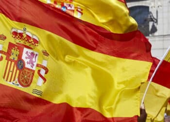 Spanish flags and coat of arms. Nation emblem. Spain