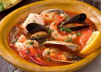 Imagem de prato com mariscos - Créditos: depositphotos.com / fudio