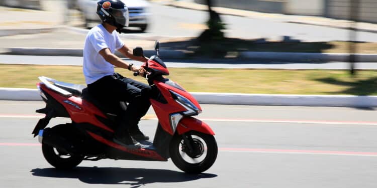 salvador, bahia, brazil january 6, 2021: biker is seen riding a motorcycle on a street in the city of Salvador. *** Local Caption ***