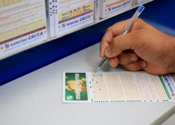 salvador, bahia, brazil - january 25, 2021: person is seen placing the Mega Sena bet in a lottery in the city of Salvador.