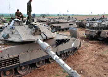 GAZA STRIP - NOV 19 2009:Israeli tank crew prepares for a land Incursion into Gaza Strip during Cast Lead operation.It was a three-week armed conflict in the Gaza Strip during the winter of 2008-2009.