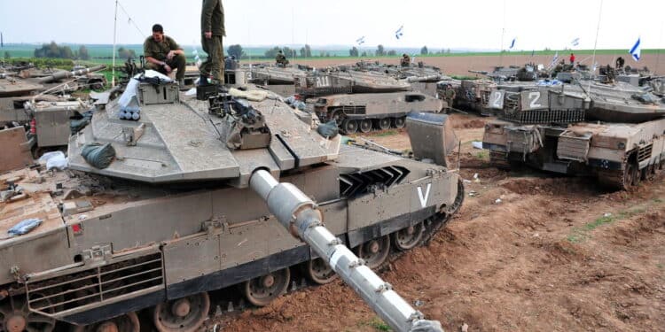 GAZA STRIP - NOV 19 2009:Israeli tank crew prepares for a land Incursion into Gaza Strip during Cast Lead operation.It was a three-week armed conflict in the Gaza Strip during the winter of 2008-2009.