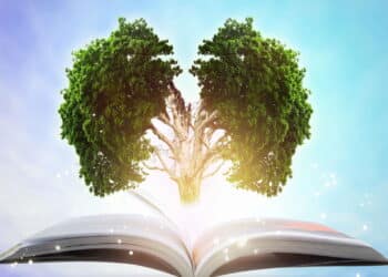 Planta em formato de pulmão emergindo de um livro // Créditos: depositphotos.com / jayzynism