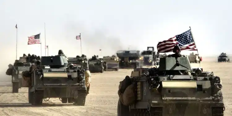 Militares dos EUA perto da fronteira entre o Kuwait e o Iraque em 18 de março de 2003  • Scott Nelson/Getty Images
