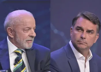 O presidente Luiz Inácio Lula da Silva e o senador Flávio Bolsonaro, durante debate da Band no domingo, 18 (TV Band/Divulgação)